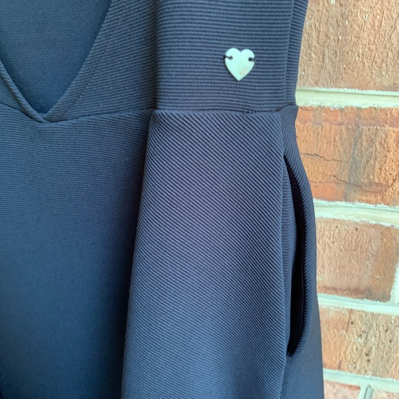 Kendall & Kylie Skater Dress with Open Back - Picture 6 of 6